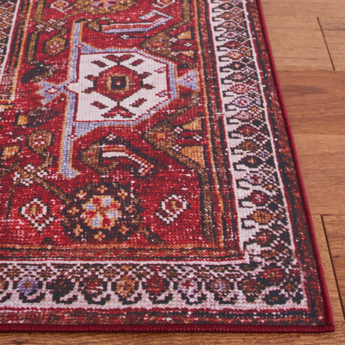 SAFAVIEH Tucson Regent Traditional Machine Washable Area Rug, 5' x 8', Navy/Rust