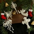 thumbnail image 1 of Adorno del árbol de Navidad Forma irregular blanca | Plástico para colgar con purpurina | Diseño de cruz de arco mariposa 14x10cm | Decoración elegante para escaparates de casas navideñas, 1 of 6