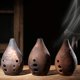 thumbnail image 1 of Flauta Xun china profesional 10 F agujeros patrón de loto de cerámica Ocarina instrumento de viento antiguo decoración del hogar para artista artista principiante, 1 of 4