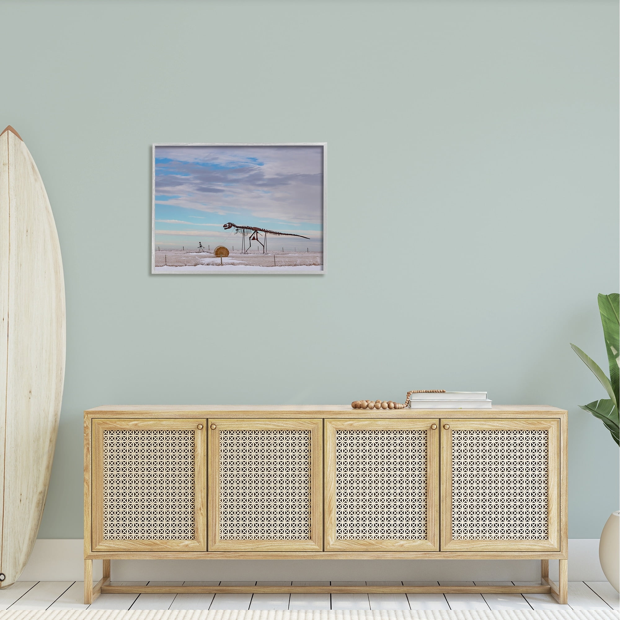 Stupell Industries Person Walking Dinosaur Skeleton Beach Sand Dunes Photograph Gray Framed Art Print Wall Art, Design by Jeff Poe Photography
