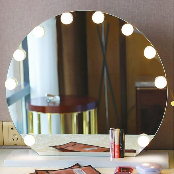 Light bulbs around mirror outlet