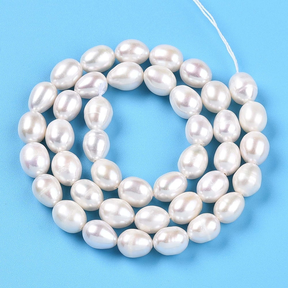 Natural Cultured Freshwater Pearl Beads Strands Rice Creamy White 8~9.5x6~7.5mm Hole: 0.7mm about 41~42pcs/strand 13.98~14.37 inch(35.5~36.5cm)