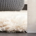 thumbnail image 4 of SAFAVIEH Cloud Hiram Distressed Polyester Shag Area Rug, Ivory/Gray, 5'3" x 7'7", 4 of 7