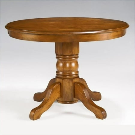 - Bowery Hill Round Pedestal Dining Table in Cottage Oak