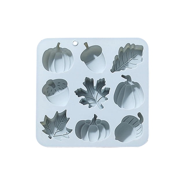 9 moldes de silicona con forma de hojas de calabaza y frutas para pasteles de chocolate con temática otoñal.
