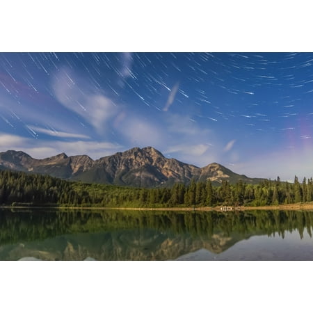 Star trails over Patricia Lake and Pyramid Mountain in Jasper National Park Alberta Canada Poster