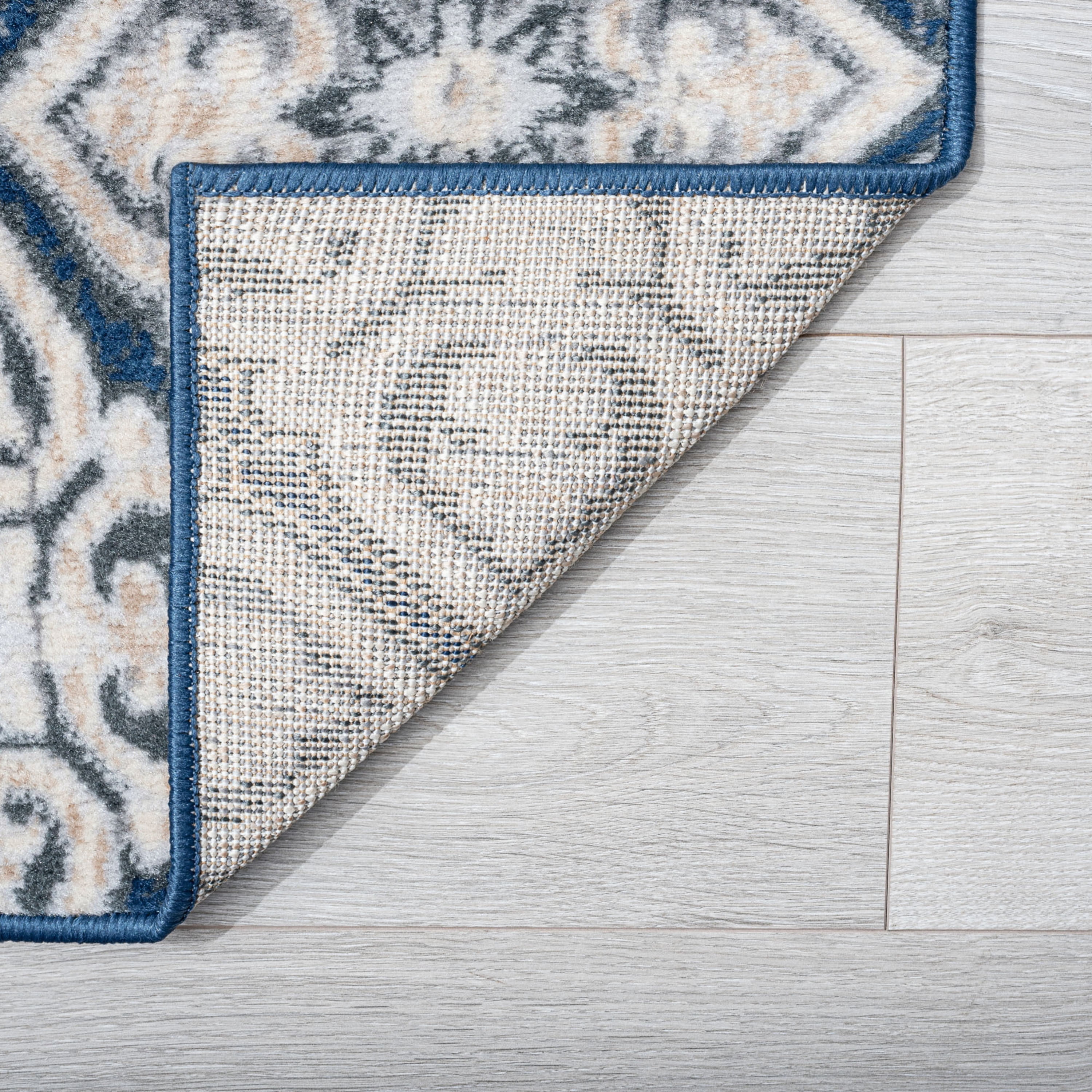 Madison Traditional 7.6' x 10' Dark Blue Polypropylene Indoor Area Rug