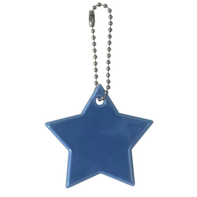 Llavero con forma de estrella de PVC con logotipo de advertencia nocturna y reflector para montar en la mochila escolar