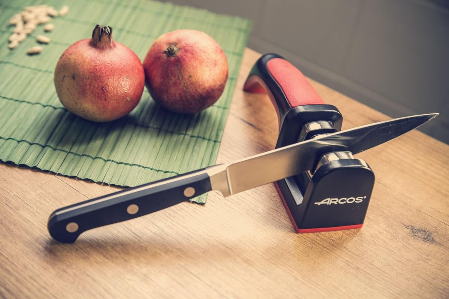 Sharpeners Manual Knife Sharpener tool. Made of + TPE. Carbide and Ceramic s. Keep Your Knives Razor Sharp. Black and Red Color