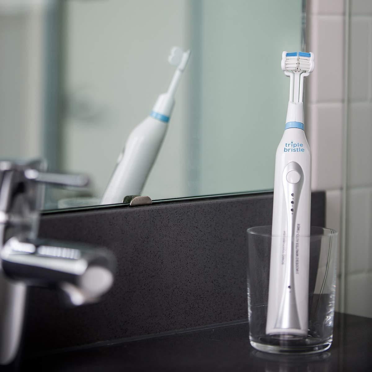 triple bristle electric toothbrush