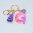 thumbnail image 1 of Hangs 2 Resin Glittering Letter Keychain with Color Stitching Flowing Design Purple Drop Glue English Character Key Chain for Daily Use, 1 of 4