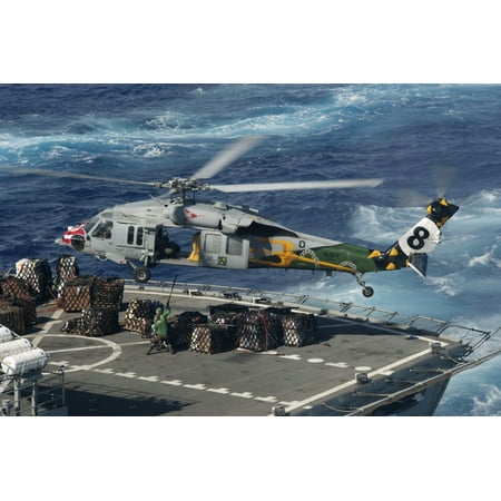 Military Sealift Command Ships - Pacific Ocean September 19 2012 - An MH-60S Sea Hawk helicopter picks up supplies from the Military Sealift Command fast combat support ship USNS Bridge Poster Print