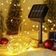 thumbnail image 2 of Guirnalda de luces solares, 12 m, 120 luces LED, decoración, 8 modos, guirnalda solar para exteriores para Halloween, jardín, árbol de Navidad, patio, banquete (blanco cálido), 2 of 5