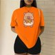 thumbnail image 3 of Playera Blusa De Capybara Comiendo Pretzel Ropa Divertida Para Mujer Capibara Color Anaranjado Talla Mediana Marca Emil SaEs, 3 of 4