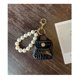 thumbnail image 4 of Llavero con colgante de bolso de perlas blancas, accesorios hechos a mano para Mini bolso, 4 of 5
