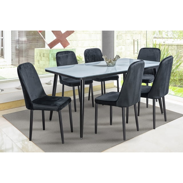 comedor max mobilkraft 6 sillas rectangular tubular cristal marmoleada modelo max negro estilo contemporáneo mesa 150 x 90 x 75 cm con cubierta de cristal marmoleado sobre base tubular metálica negra y seis sillas acojinadas tapizadas en suede negro; vista frontal 3/4 en ambiente iluminado. También suele usarse como mesa de trabajo para reuniones pequeñas.