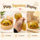 thumbnail image 4 of Pelota antiestrés tipo dumpling dorada con glitter Crossunx, 4 of 7