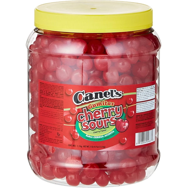 jelly beans cherry sour Tarro transparente de 1.5 kg con tapa amarilla, lleno de jelly beans rojos; etiqueta frontal roja de Canel's que indica cherry sours y muestra cerezas, apto para dulces y postres.
