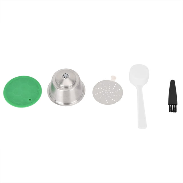 cápsula de café de acero para dolce gusto, cápsula recargable reutilizable de acero inoxidable de próxima generación con tapa verde, filtro fino perforado, cuchara blanca y cepillo de limpieza alineados sobre fondo blanco; diseñada para reutilizarse más de 1000 veces y compatible con máquinas Dolce Gusto, también suele usarse para llevar porciones de café molido en viajes.