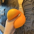 thumbnail image 3 of Juguete para exprimir el alivio del estrés de mandarina | Diseño realista de mandarina fea | Construcción de TPR suave | Alivio de la ansiedad | Fidget y Terapia Sensorial | Tamaño de bolsillo |, 3 of 5