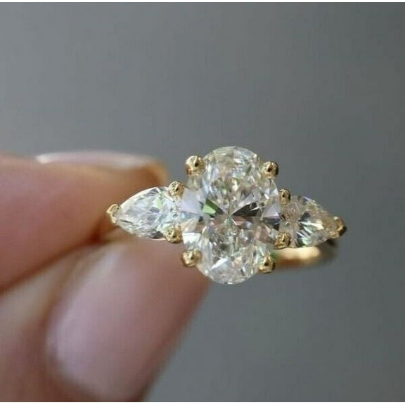 3Ct Oval Cut Lab-Created Diamond Women's 3-Stone Engagement Ring 14K Yellow Gold Plated Silver