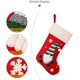 thumbnail image 3 of 1 pieza de calcetín navideño rojo, calcetines navideños de gnomo, muñeca sin rostro, bolsa de regalo de dulces para niños, para decoraciones navideñas para fiestas familiares en interiores, 3 of 5