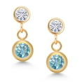 thumbnail image 2 of Gem Stone King 14k Yellow Gold Blue Zircon and White Moissanite Two Stone Dangle Earrings for Women (1.20 Cttw, Gemstone, Round 4MM, Round 3MM), 2 of 4