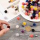 thumbnail image 4 of 100 pompones de tela, piel sintética y metalizados para pendientes y colgantes. Bolas esponjosas de colores para manualidades., 4 of 9