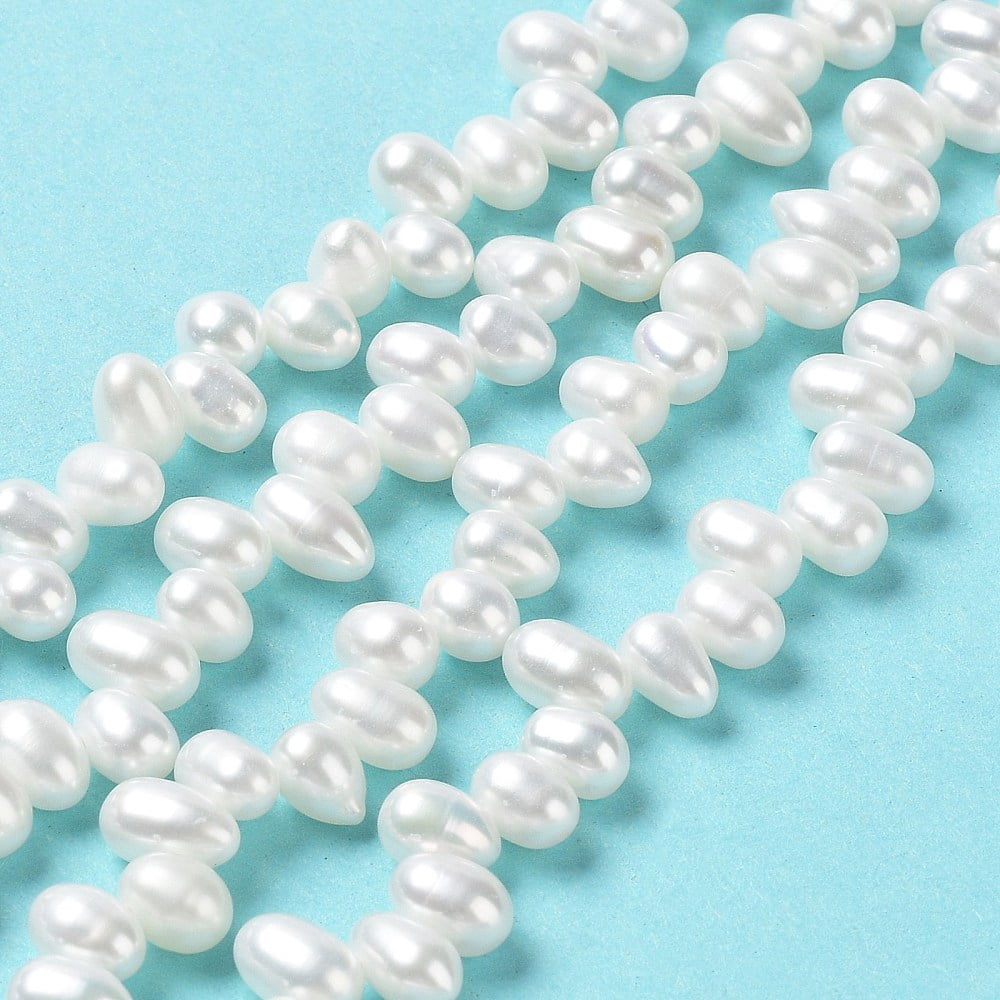 1strand Natural Cultured Freshwater Pearl Beads Strands Grade 6A+ Rice Seashell color 7~8x4~5mm Hole: 0.5mm about 70pcs/strand 13.66''(34.7cm)