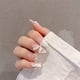 thumbnail image 1 of Uñas postizas ovaladas Prensa elegante en las uñas Pajarita 3d Uñas francesas postizas Uñas acrílicas redondas para mujeres y niñas,11 Feliz Sencillez, 1 of 4