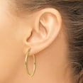thumbnail image 2 of 14K Yellow Gold Engraved Diamond Cut 1.20 inch Round Hoop Earrings, 2 of 3