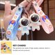 thumbnail image 2 of juego de 2 llaveros con forma de astronauta de dibujos animados, bonitos colgantes para bolsos de coche., 2 of 8