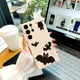 thumbnail image 3 of Manténgase a la moda y proteja su iPhone con esta innovadora funda de TPU a prueba de golpes con dibujos animados, 3 of 4