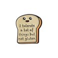 thumbnail image 1 of Broche con forma de pan divertido con la frase «Tolero mucho», 1 of 3