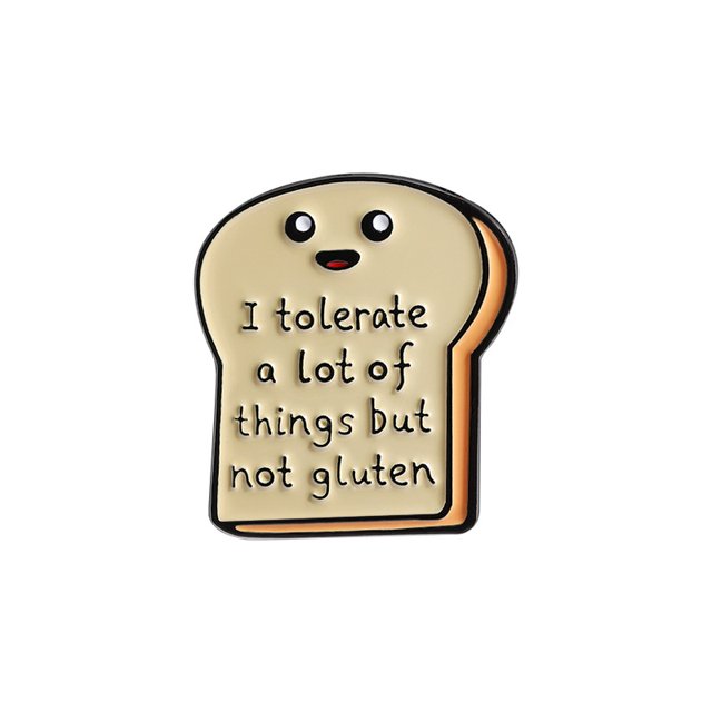 Broche con forma de pan divertido con la frase «Tolero mucho»