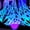Fluorescent White, variant on Giant outdoor Halloween spider web decoration, including one blacklight and ten ground stakes; made from highly elastic mesh fabric that allows for flexible, customizable stretching—perfect for decor