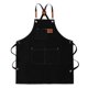 thumbnail image 1 of Delantal de chef de lona con peto ajustable, bolsillos, tirantes cruzados en la espalda e impermeable. Negro, 1 of 9