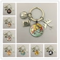 thumbnail image 2 of Llavero con mapa del mundo para viajar, explorar la cúpula de cristal, llavero con colgante de avión Cabachon, llavero de joyería de regalo para hombres y mujeres. Dengxun unisex, 2 of 2