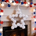 thumbnail image 1 of Corona de estrellas con pompones para la decoración de la puerta del Día de la Independencia | Corona patriótica de estrellas de cinco puntas con pompones, 1 of 6