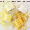 thumbnail image 1 of Threadart 4mm Silk Ribbon Set - Yellow Shades - Four Spool Collection - 100% Pure Silk Ribbon - 10m (11yd) Spools - 44 Yards of Ribbon, 1 of 7