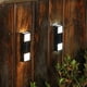thumbnail image 1 of Luces solares de pared exterior - Aplique moderno de arriba abajo con 6 cuentas LED, impermeable IP65, ABS+PC negro, pack de 2 para porche y patio jardín, 1 of 6