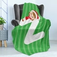 thumbnail image 4 of Christmas Alphabet Soft Flannel Fleece Throw Blanket, Print of a Girl Lying on a Letter Z Celebration Time, Cozy Plush for Indoor and Outdoor Use, 70" x 90", Green Dark Coral and White, by Ambesonne, 4 of 5
