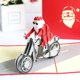 thumbnail image 1 of Tarjeta de Navidad emergente 3D, 3 piezas, tarjetas de felicitación navideñas hechas a mano con sobre para regalos de cumpleaños, vacaciones, tarjetas navideñas, tarjeta de agradecimiento de motocicleta de Papá Noel Rojo Verde, 1 of 5