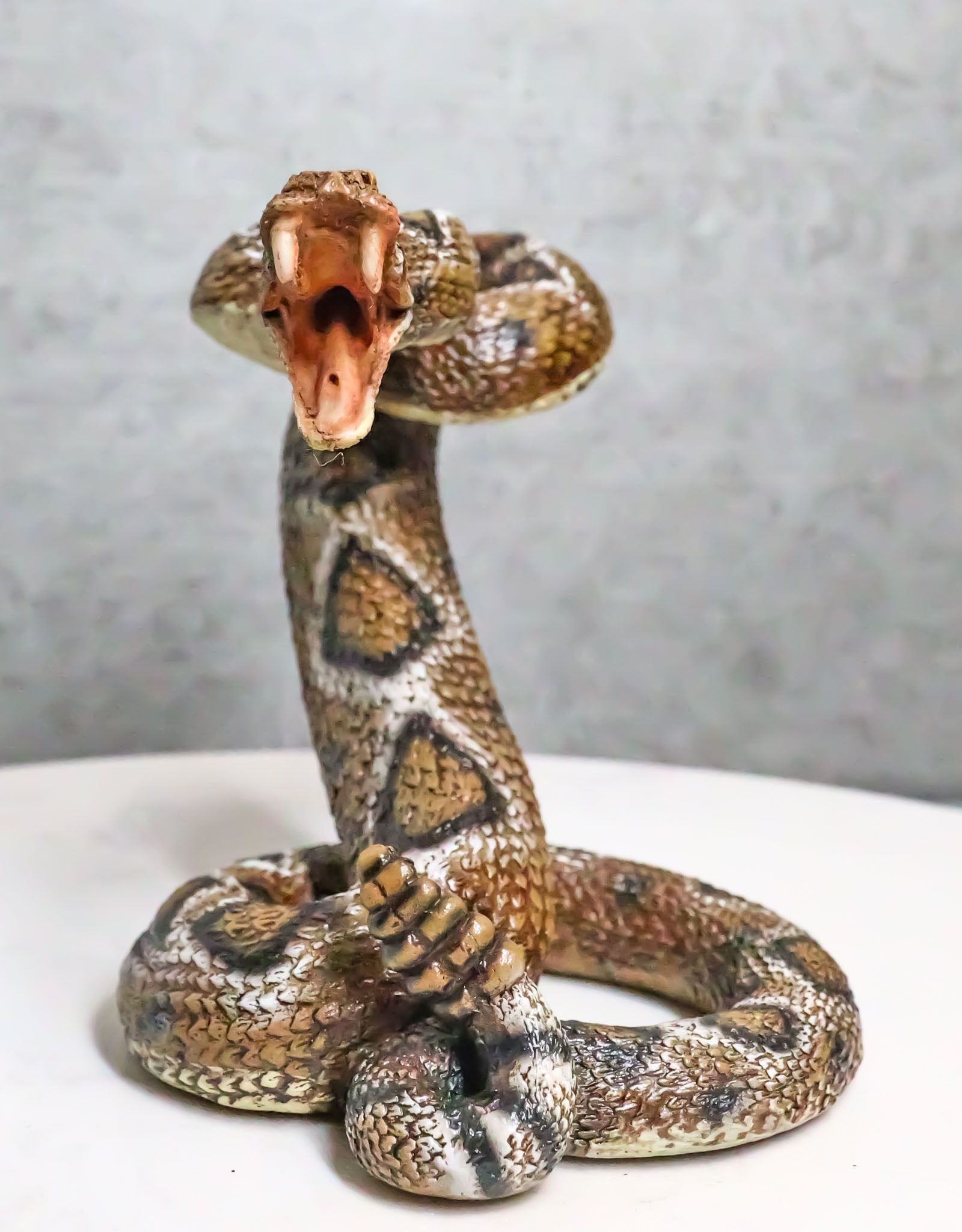 Realistic Ferocious Attacking Diamondback Rattlesnake With Fangs Bared