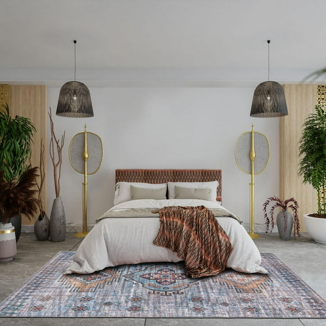 Oriental Persian style area rug from ECARPET Kashkuli Collection featuring eco-friendly, machine washable design beneath a bed in contemporary room.
