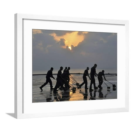 Navy Flight Deck - U.S. Navy Sailors Wash Down the Flight Deck of the Aircraft Carrier USS Nimitz Framed Print Wall Art By Stocktrek Images