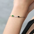 thumbnail image 4 of Gem Stone King 0.84 Ct Oval Green Nano Emerald Black Onyx 925 Silver and 10K Yellow Gold Lab Grown Diamond Bracelet for Women, 4 of 4