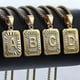 thumbnail image 4 of Collar con colgante de letra inicial AZ de acero inoxidable chapado en oro amarillo y cadena tipo caja, 4 of 5