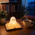 thumbnail image 5 of Halloween Ghost Figurine Statue Lamp, Ghost on Open Book LED Tea Light Holder, Cute Halloween Decor for Bookshelf, Desk & Mantel, Cozy Book Lovers Ornament for Bedroom & Reading Nooks, 5 of 5