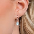 thumbnail image 4 of Gem Stone King 925 Sterling Silver Sky Blue Topaz Dangle Dangling Earrings for Women (2.30 Cttw, Gemstone November Birthstone, Emerald Cut 7X5MM), 4 of 5